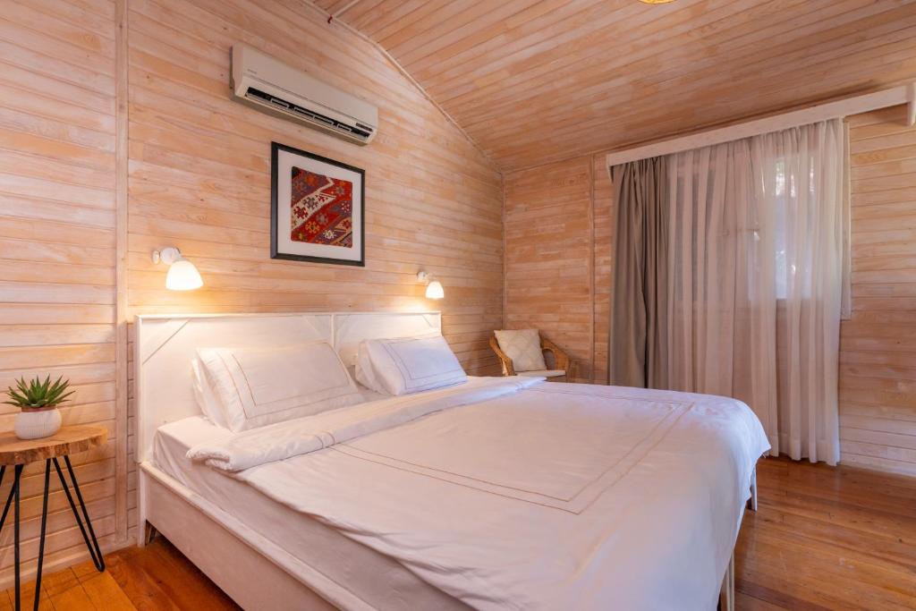 Postel nebo postele na pokoji v ubytování Alicra Hotel Çıralı
