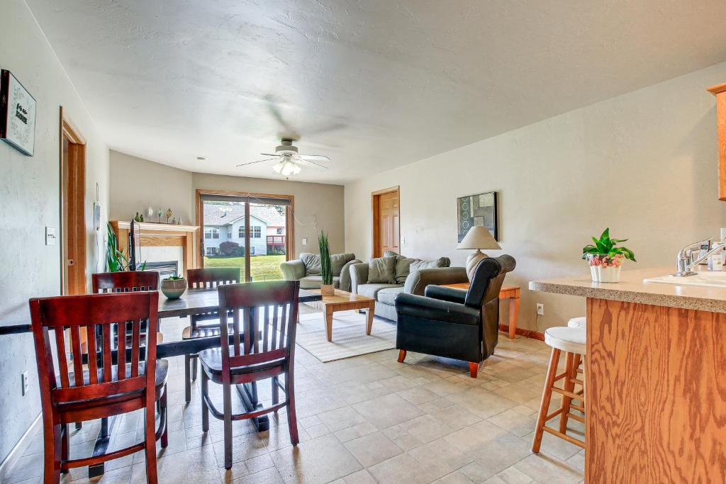 a kitchen and living room with a table and chairs at Family-Friendly Unit 8 Mi to Appleton Downtown! in Appleton
