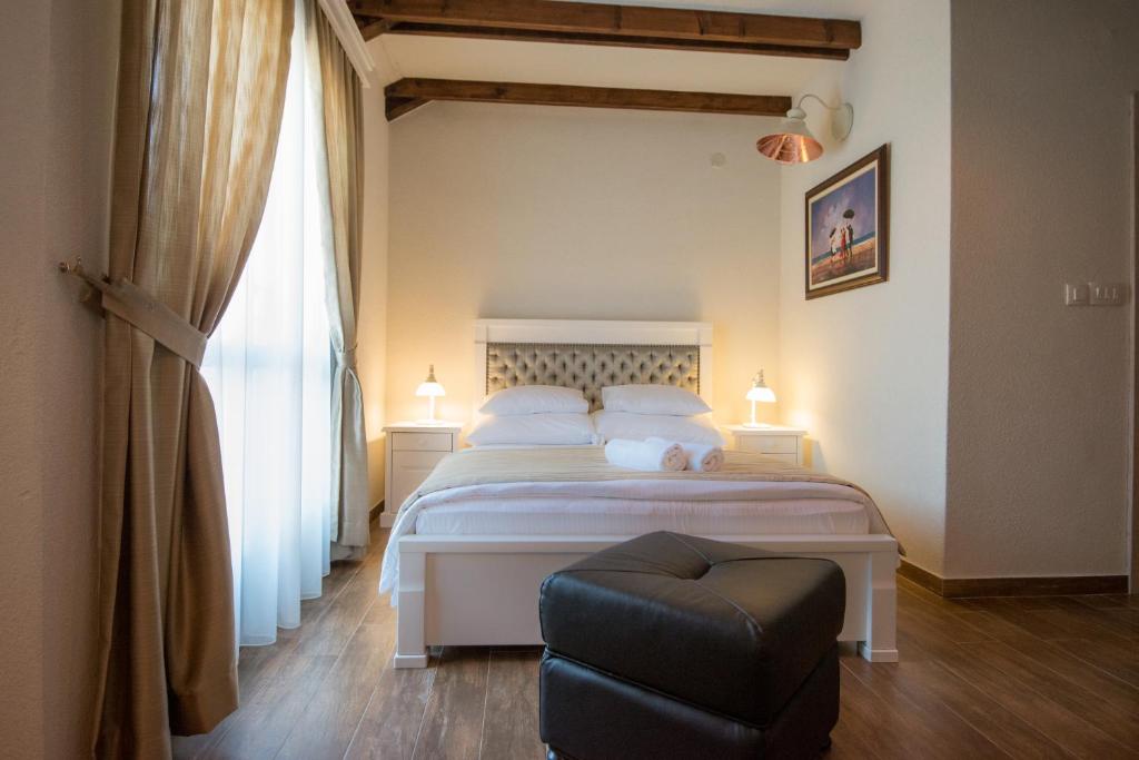 Postel nebo postele na pokoji v ubytování Apartments Marija