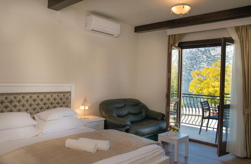 Postel nebo postele na pokoji v ubytování Apartments Marija