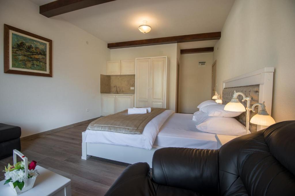 Postel nebo postele na pokoji v ubytování Apartments Marija
