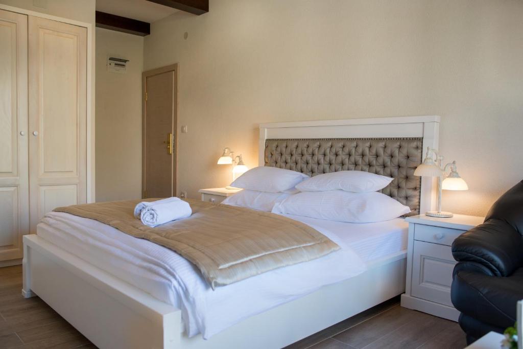 Postel nebo postele na pokoji v ubytování Apartments Marija