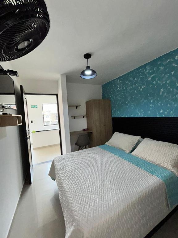 Postel nebo postele na pokoji v ubytování Hotel Lesus