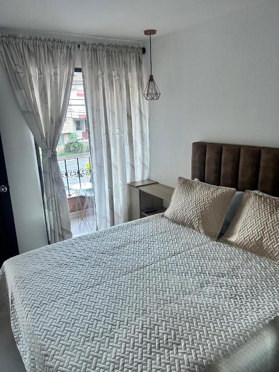 Postel nebo postele na pokoji v ubytování Hotel Lesus