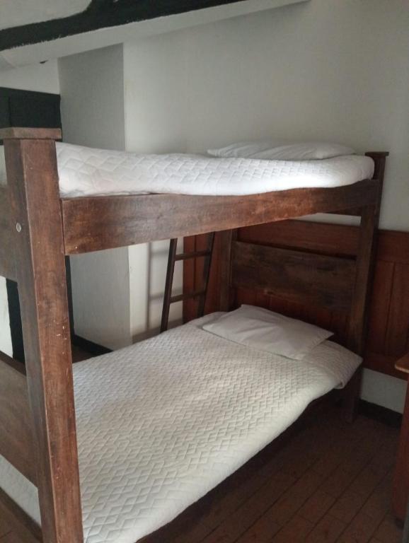 Postel nebo postele na pokoji v ubytování Villa Candelaria Hostel