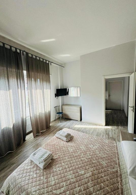 Postel nebo postele na pokoji v ubytování Hotel Ristorante Sbranetta