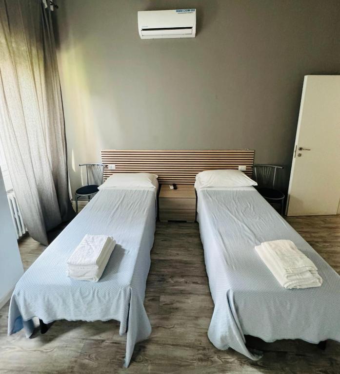 Postel nebo postele na pokoji v ubytování Hotel Ristorante Sbranetta