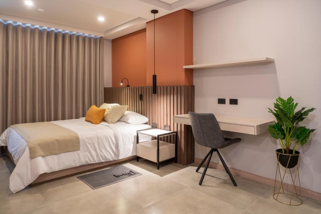 Postel nebo postele na pokoji v ubytování Hotel Living 35 Suites