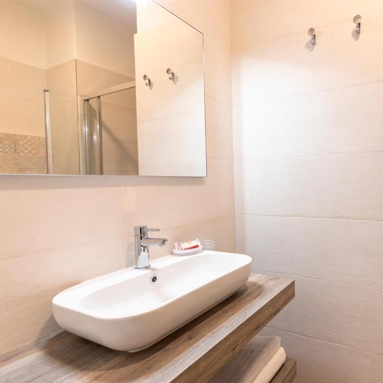 Koupelna v ubytování Hotel Paolina