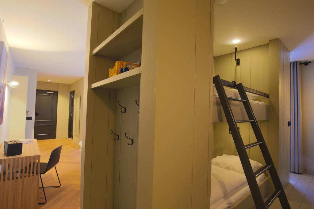 Postel nebo postele na pokoji v ubytování Hotel Abdij Dokkum