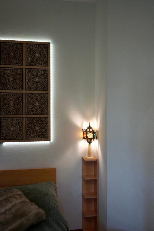 Postel nebo postele na pokoji v ubytování Barbaras Felsenlodge