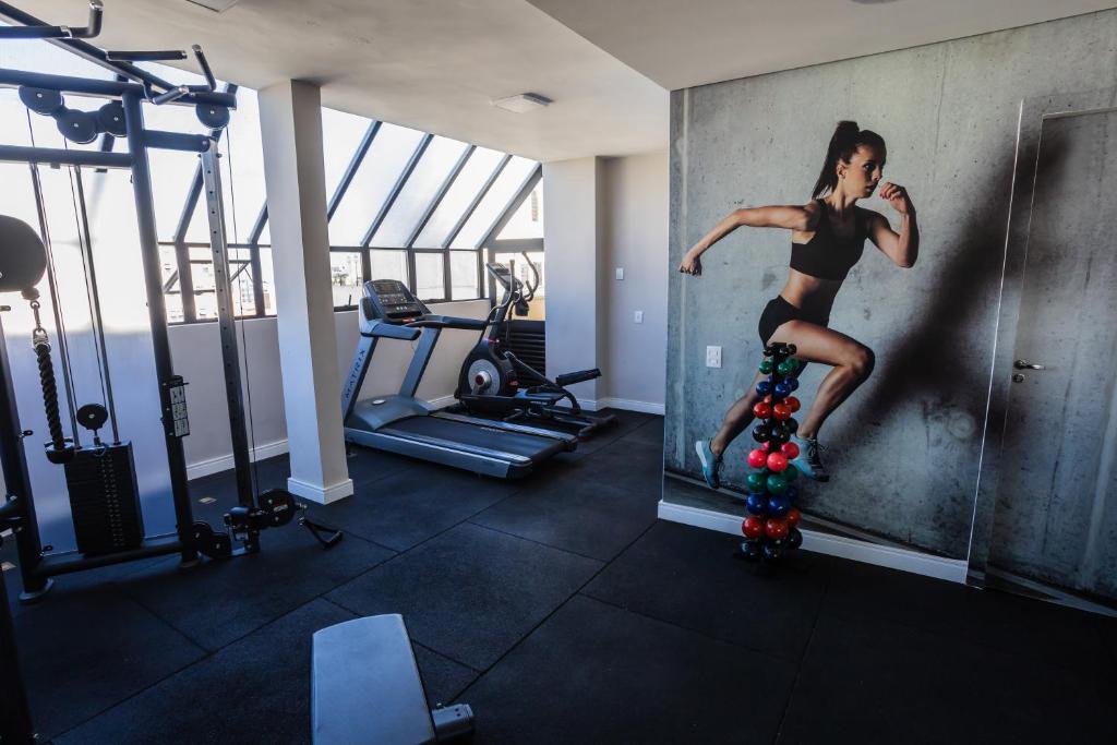 a woman is on a skateboard in a gym at Hotel Trianon Paulista in Sao Paulo