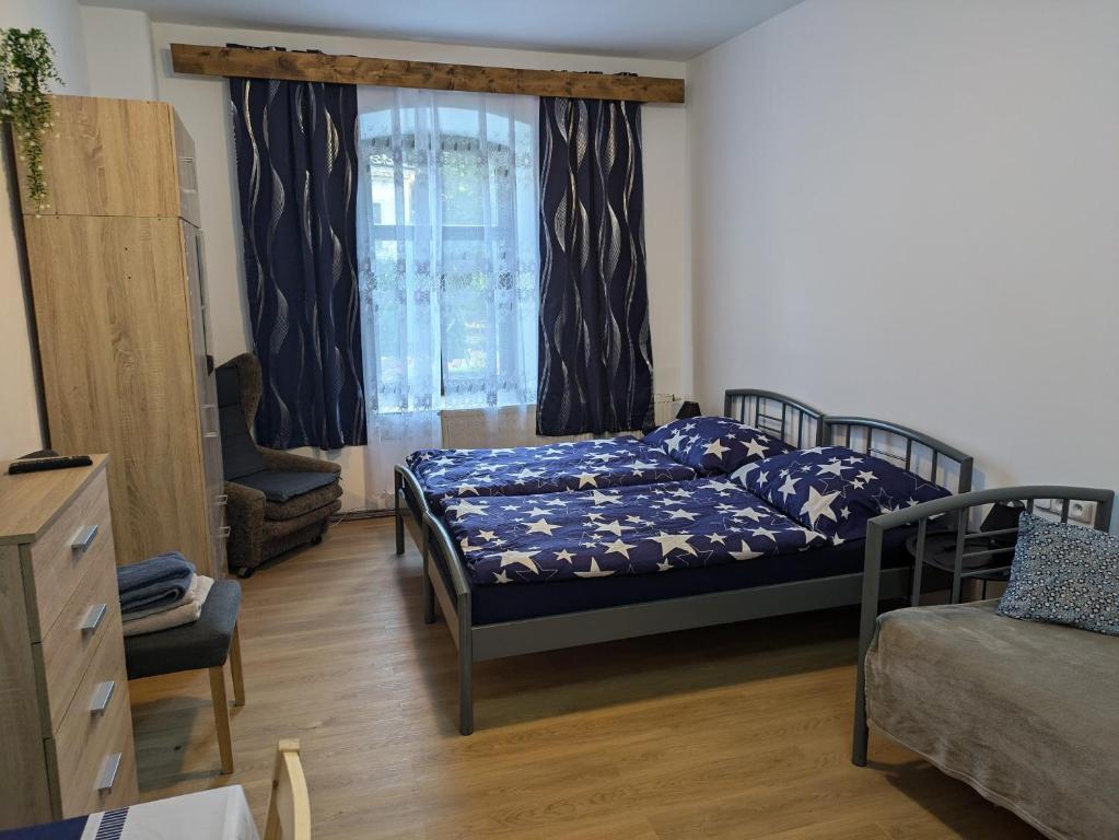 Postel nebo postele na pokoji v ubytování Ubytování u zámku