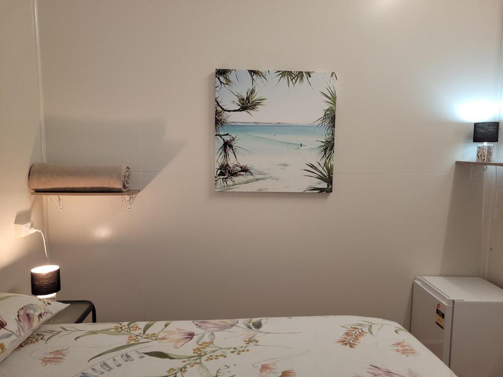 Postel nebo postele na pokoji v ubytování Travellers Paradise