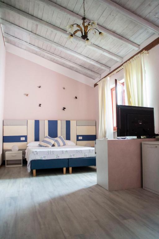 TV a/nebo společenská místnost v ubytování Casa di Nina