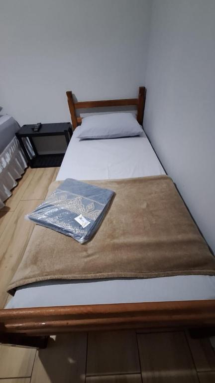 Postel nebo postele na pokoji v ubytování Hostel My House quartos perto do aeroporto de Guarulhos