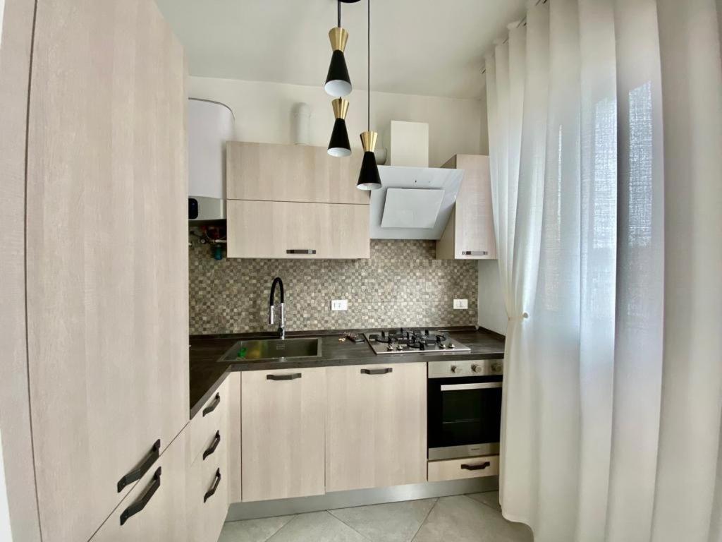Kuchyň nebo kuchyňský kout v ubytování Giuggiola Apartment