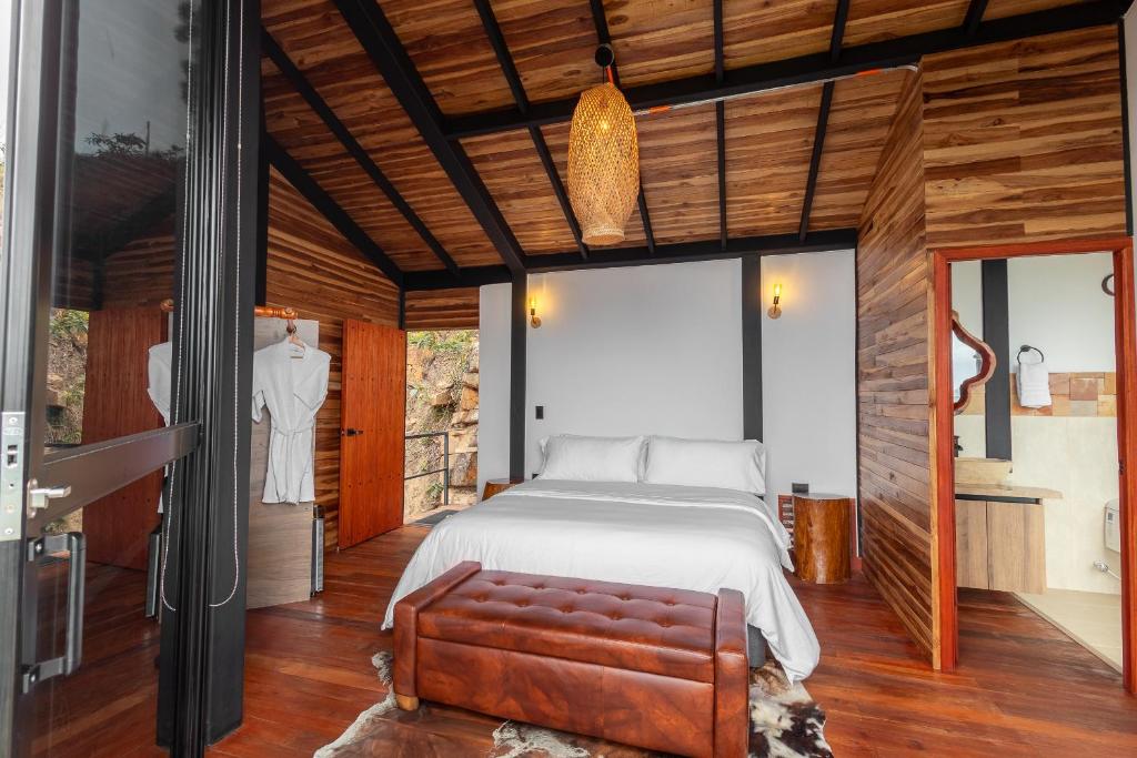 Katil atau katil-katil dalam bilik di Hotel Aborígenes