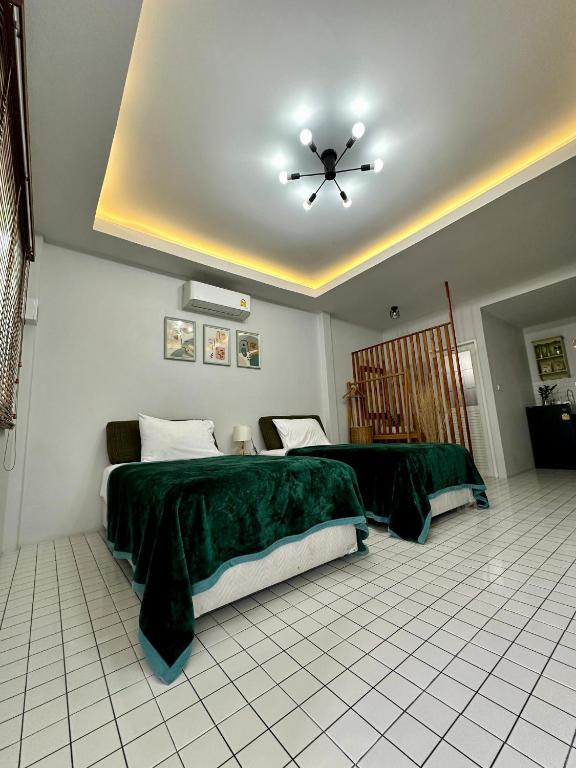 Postel nebo postele na pokoji v ubytování Bann Kam B&B