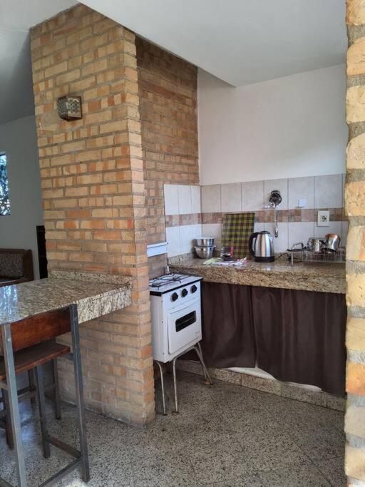 Kuchyň nebo kuchyňský kout v ubytování Amplio departamento céntrico