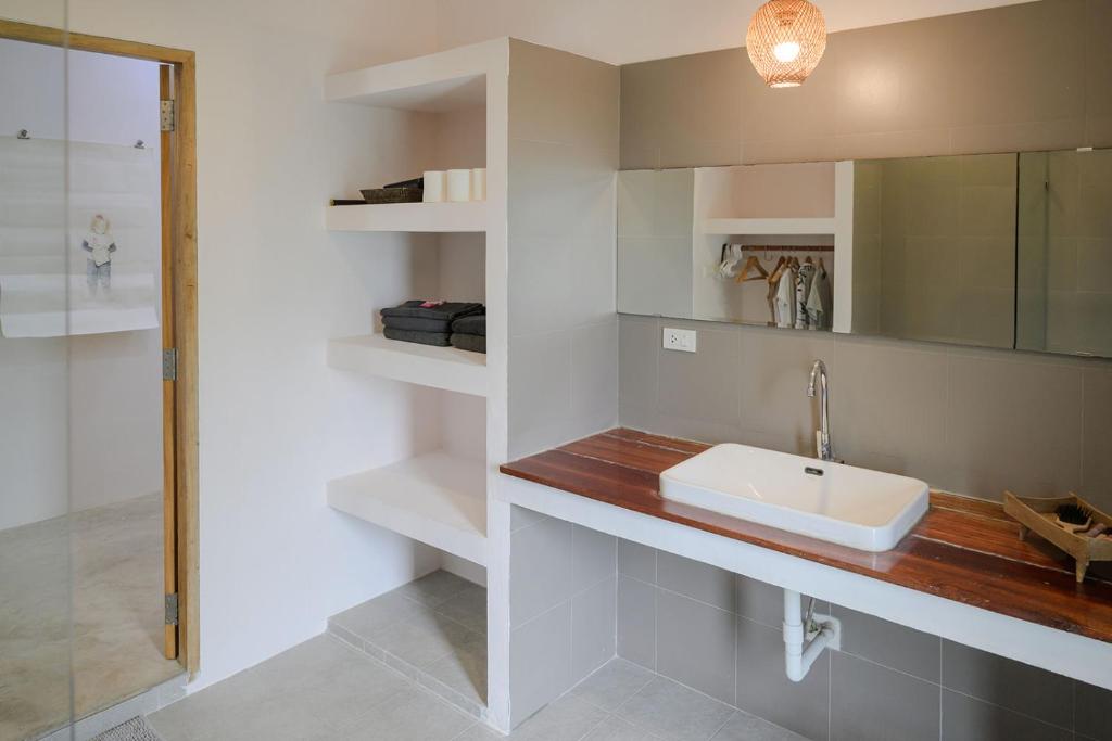 Kuchyň nebo kuchyňský kout v ubytování Boonya Swiss Home