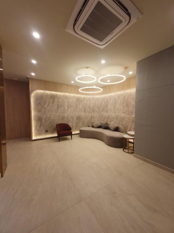 Posezení v ubytování True Blue Hotel Menteng