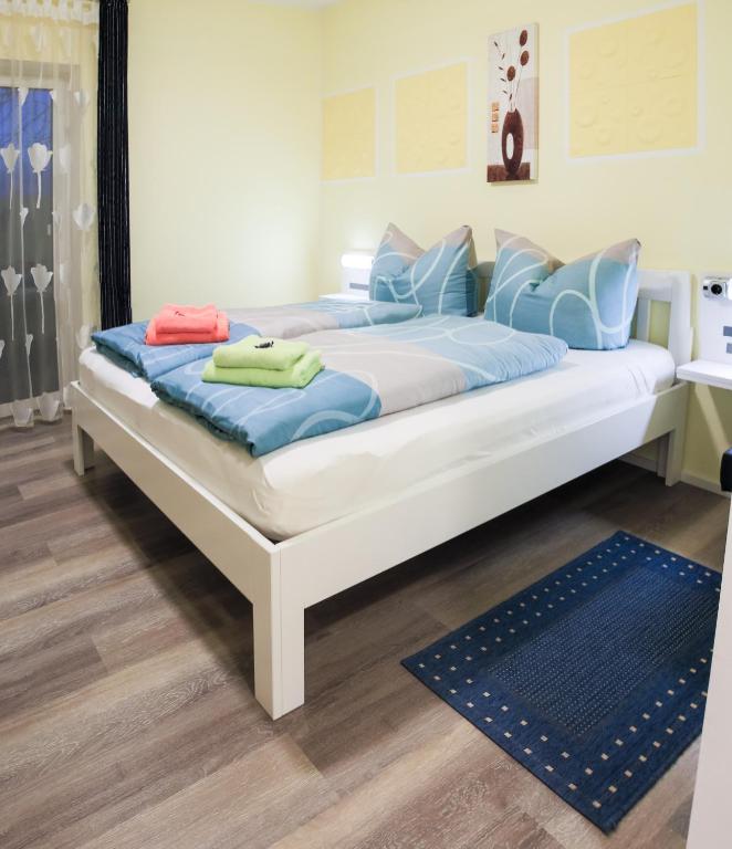 Posteľ alebo postele v izbe v ubytovaní Gästehaus Sabina- Frühstückspension, Bed & Breakfest