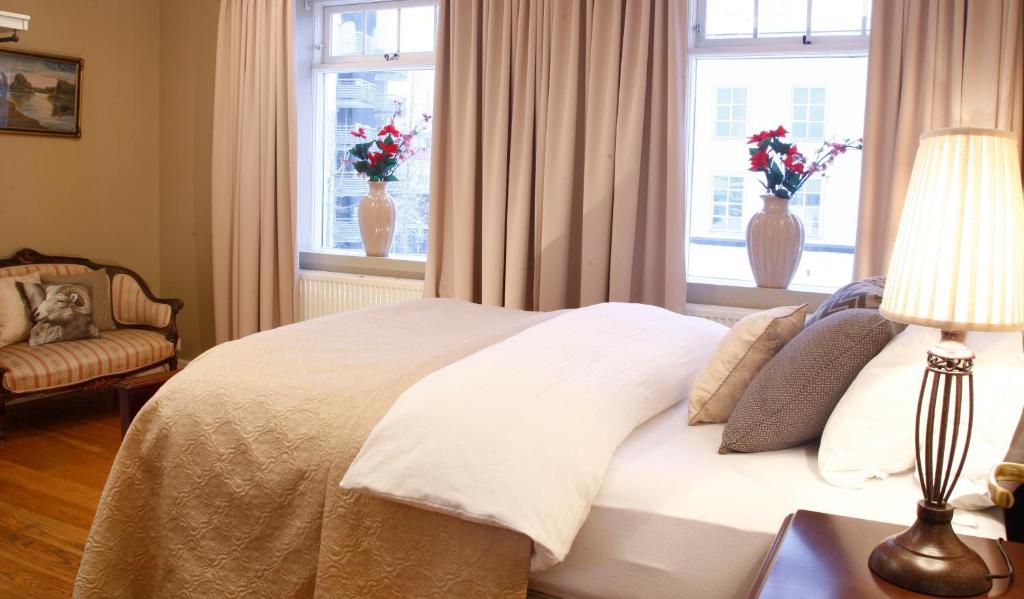 Postel nebo postele na pokoji v ubytování BG4 Guesthouse