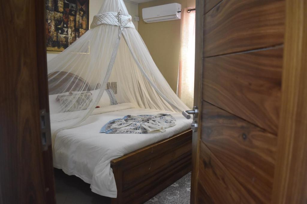Postel nebo postele na pokoji v ubytování Blue Lagoon Villa
