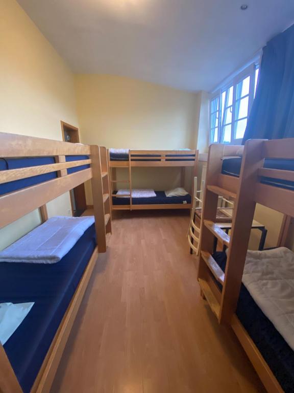 Postel nebo postele na pokoji v ubytování Gîte Kaleo Han-Sur-Lesse