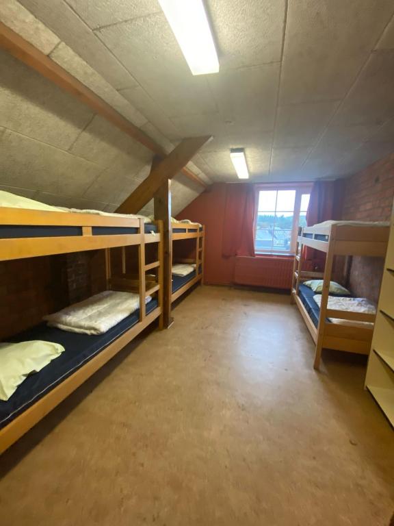 Postel nebo postele na pokoji v ubytování Gîte Kaleo Han-Sur-Lesse