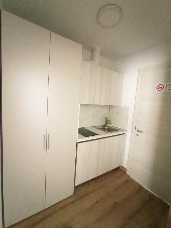 Kuchyň nebo kuchyňský kout v ubytování Affittacamere Ai Pila