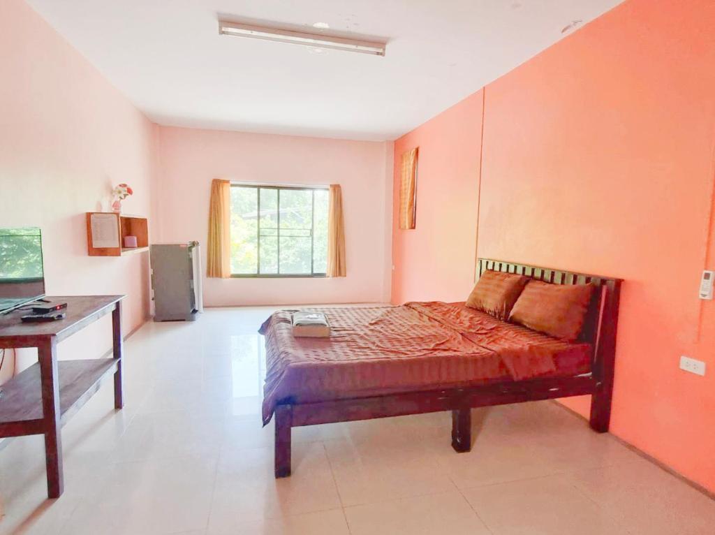 Postel nebo postele na pokoji v ubytování Banyan Resort Bangsaen