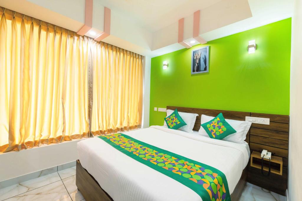 Voodi või voodid majutusasutuse Treebo Airsuite Airport Hotel toas