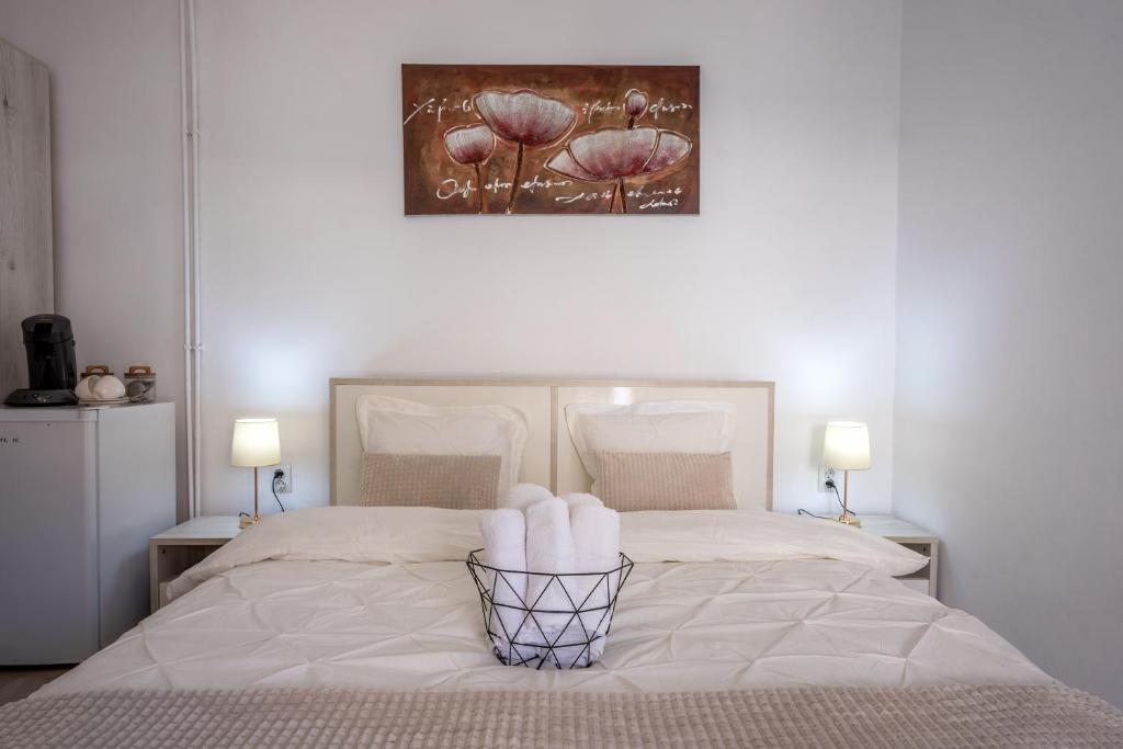 Ένα ή περισσότερα κρεβάτια σε δωμάτιο στο Central Amelie Accommodation