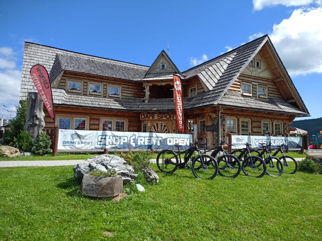 a group of bikes parked in front of a building at Penzion Damisport in Donovaly