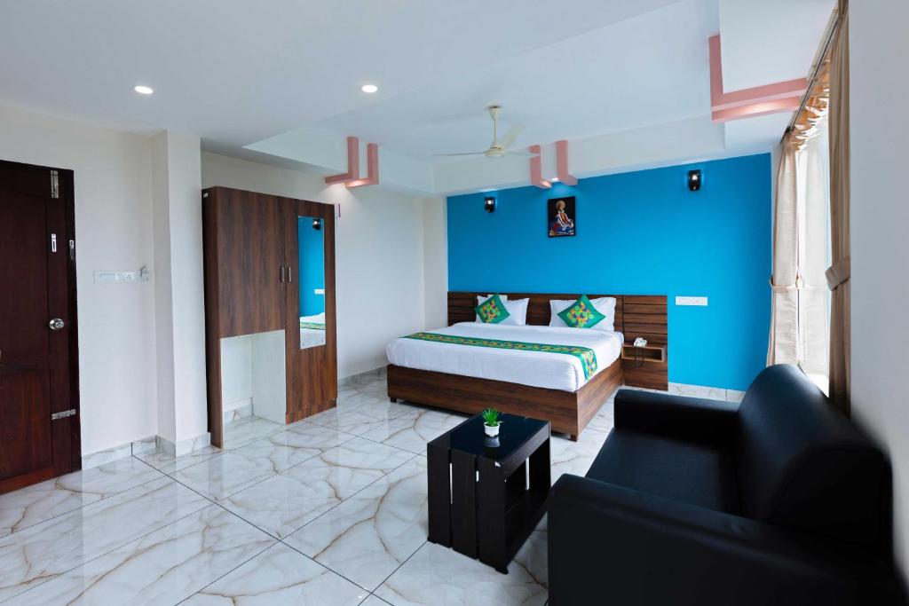 Voodi või voodid majutusasutuse Treebo Airsuite Airport Hotel toas