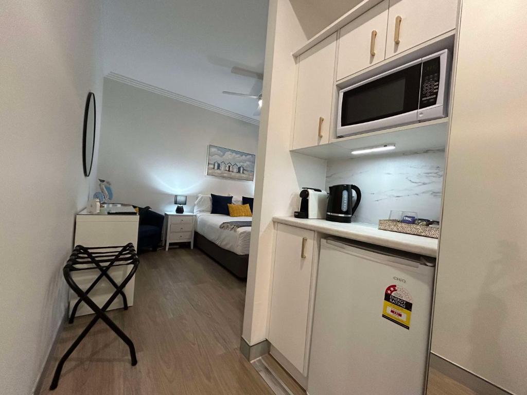 Kuchyň nebo kuchyňský kout v ubytování Redvue Holiday Apartments