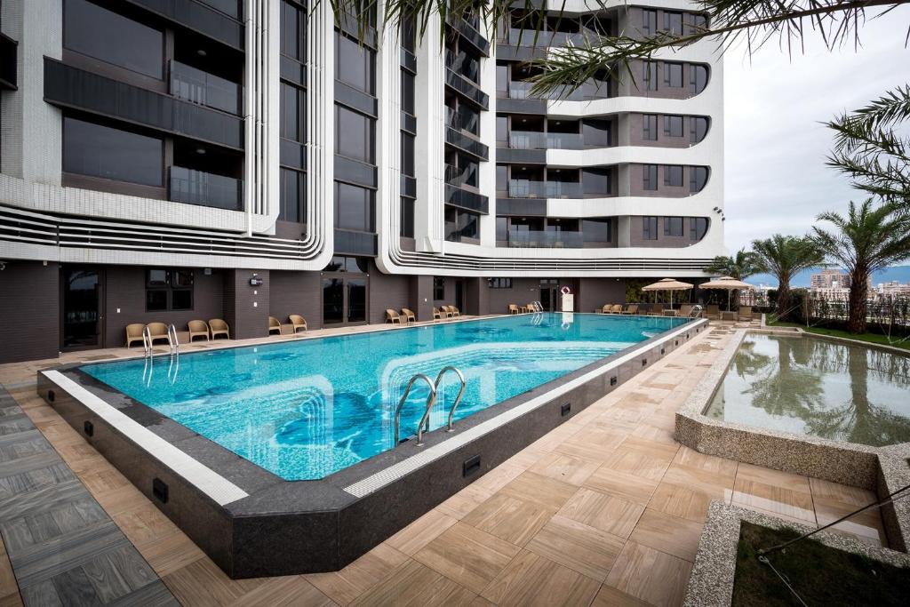 Bazén v ubytování Cuncyue Hot Spring Resort nebo v jeho okolí
