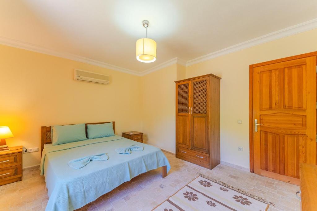 Postel nebo postele na pokoji v ubytování Villa Doğa
