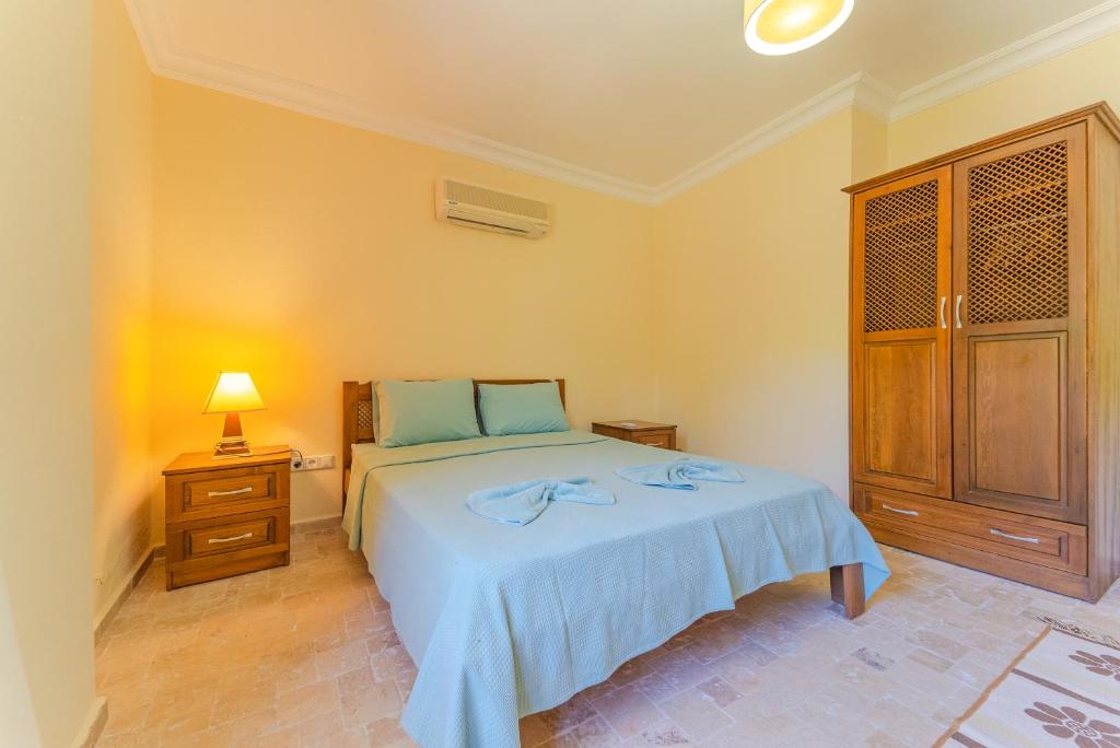 Postel nebo postele na pokoji v ubytování Villa Doğa