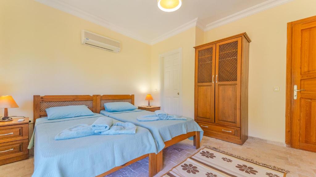 Postel nebo postele na pokoji v ubytování Villa Doğa