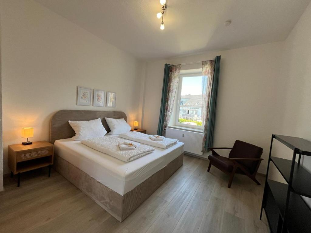 Ένα ή περισσότερα κρεβάτια σε δωμάτιο στο Sonnenschein-Apartment