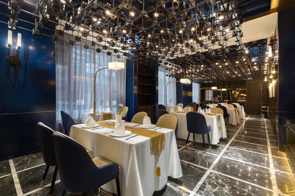 Restaurace v ubytování Jingli Hotel - Beijing New National Exhibition Capital Airport
