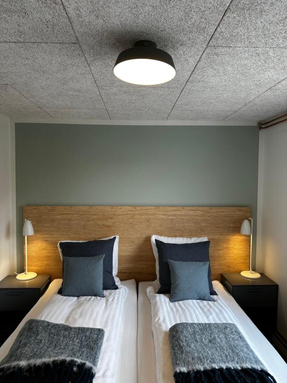 Postel nebo postele na pokoji v ubytování Hotel Disko Island