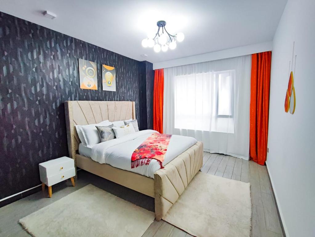 Ένα ή περισσότερα κρεβάτια σε δωμάτιο στο Haven Suites