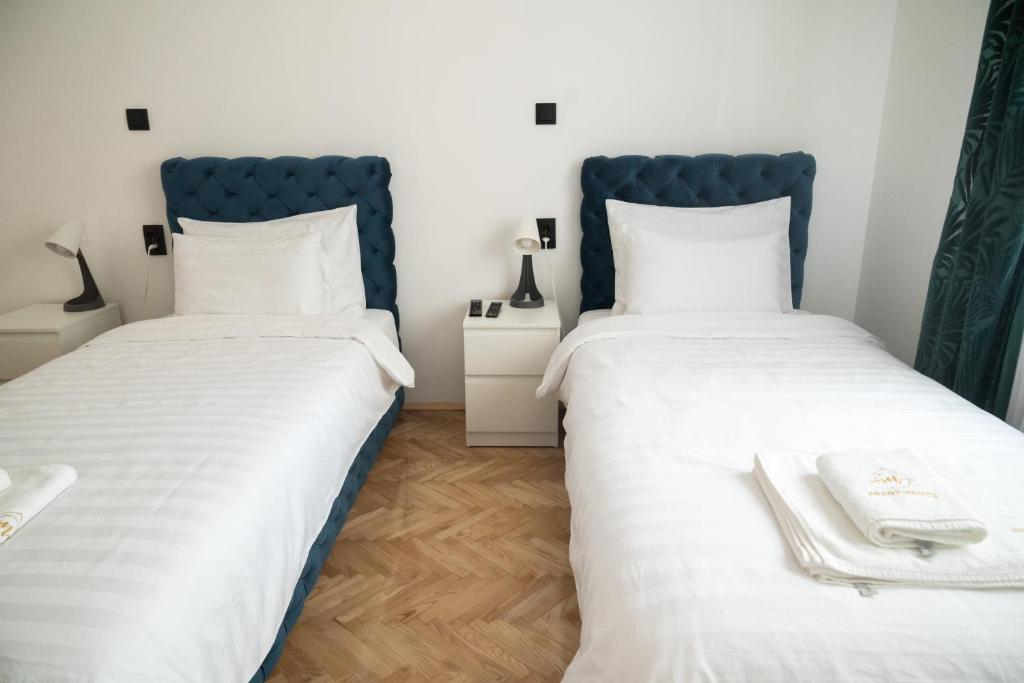 Postel nebo postele na pokoji v ubytování M1-apartments