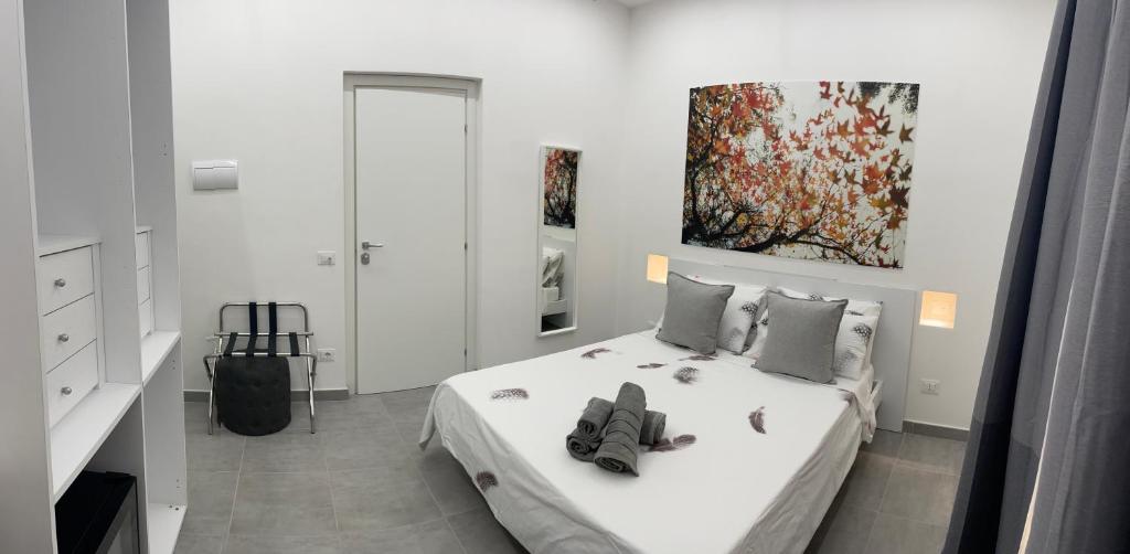 Postel nebo postele na pokoji v ubytování La Corte dei Desideri