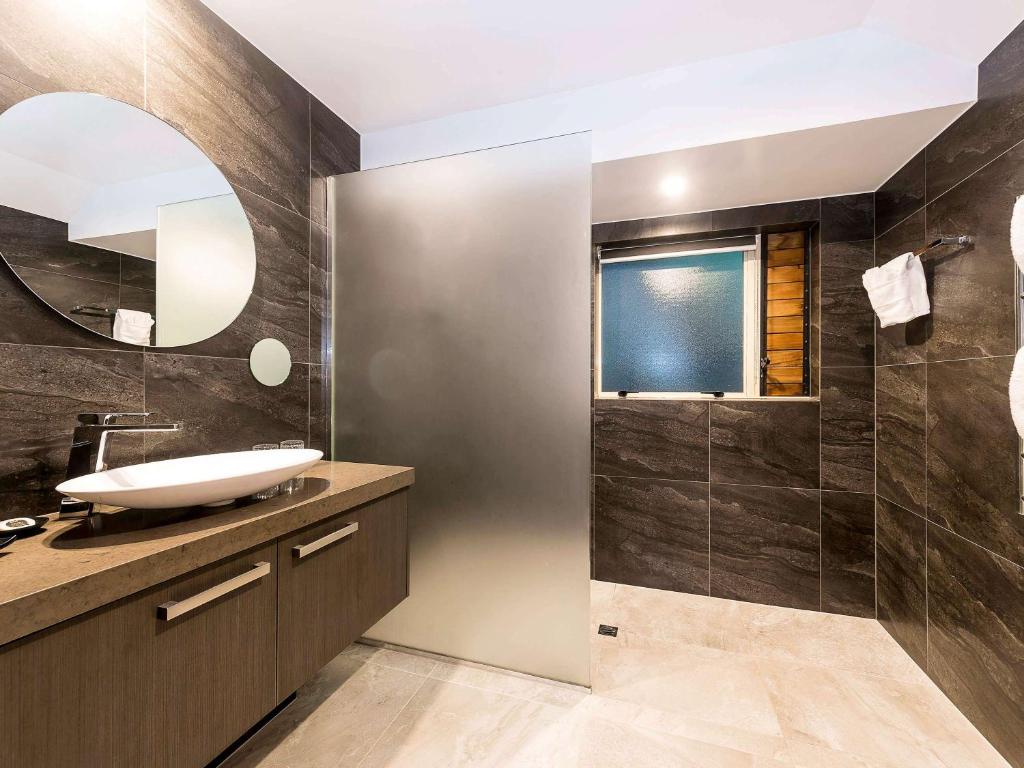 Koupelna v ubytování Grand Mercure Puka Park Resort