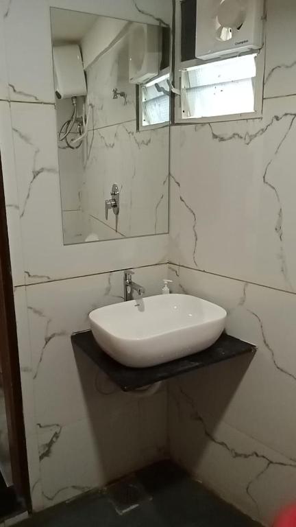 Koupelna v ubytování Hotel Nobel Inn